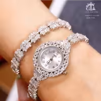 ساعت و دستبند نقره بسیار شکیل با عیار 925 و آبکاری طلاسفید موتور میوتای ژاپن اصل