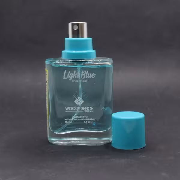 عطر جیبی وودی سنس لایت بلو مردانه و زنانه حجم 30 میلی لیتر /