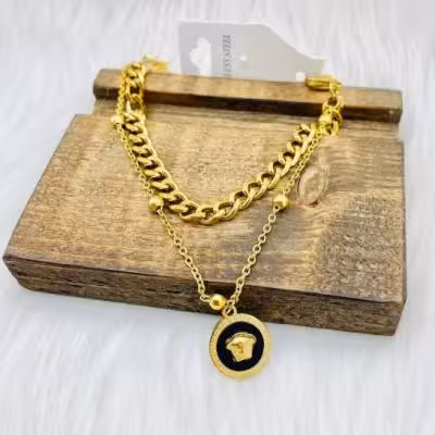 دستبند استیل 2لاین کارتیر اویز ورساچ