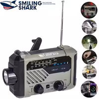چراغ قوه شارژی و لامپ کمپینگ خورشیدی ضدآب چندمنظوره اسمایلینگ شارک مدل Smiling Shark YJ-D290 با رادیو، پاوربانک و ژنراتور دستی