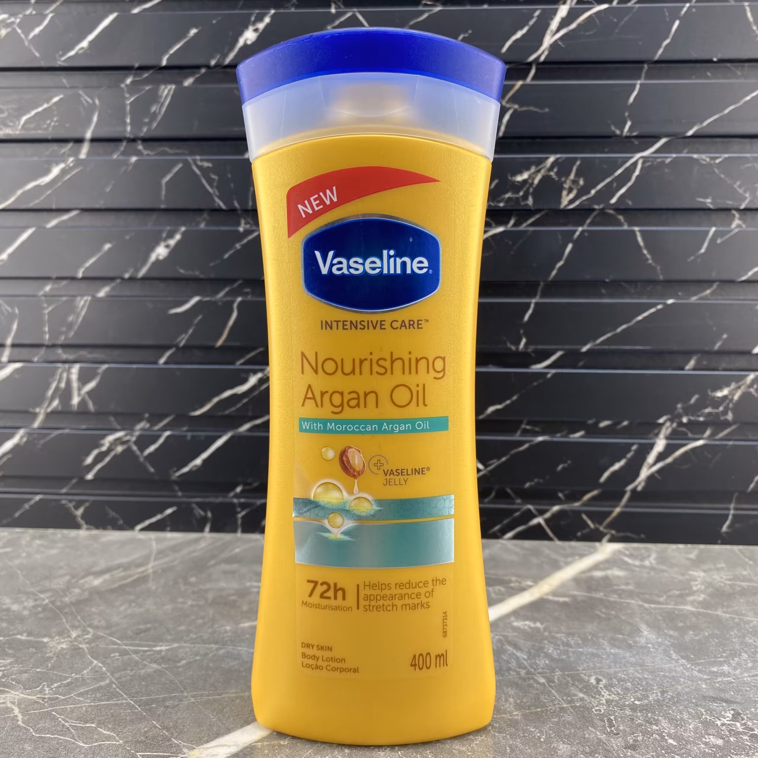 لوسیون بدن وازلین مدل Nourishing Argan Oil حجم 400 میل
