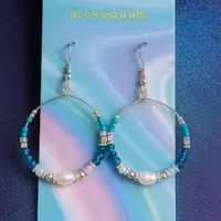 گوشواره آویز مرواریدی آبی برند accessories