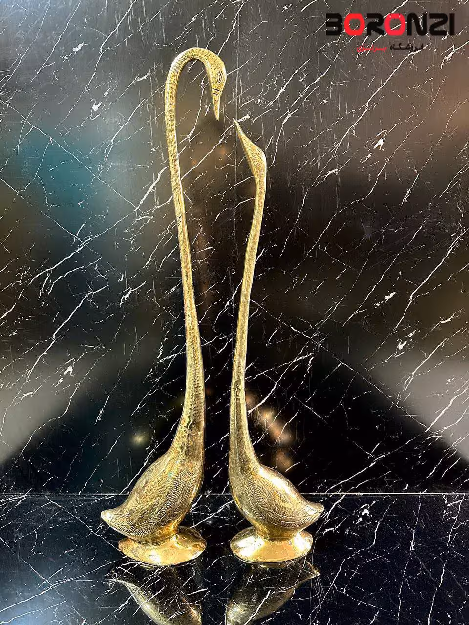 مجسمه برنزي قو 90