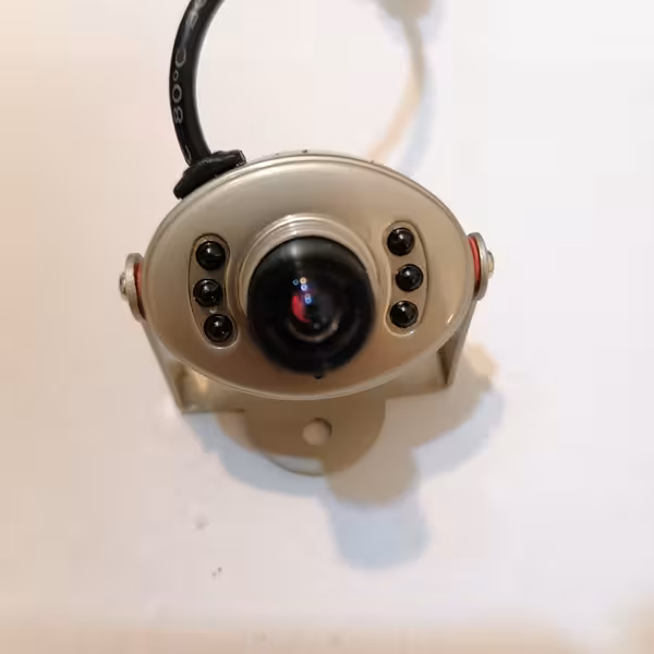 دوربین سوپر مینی مدل HT210C با خروجی صدا و تصویر رنگی با بدنه فلزی Power: DC 8~9v