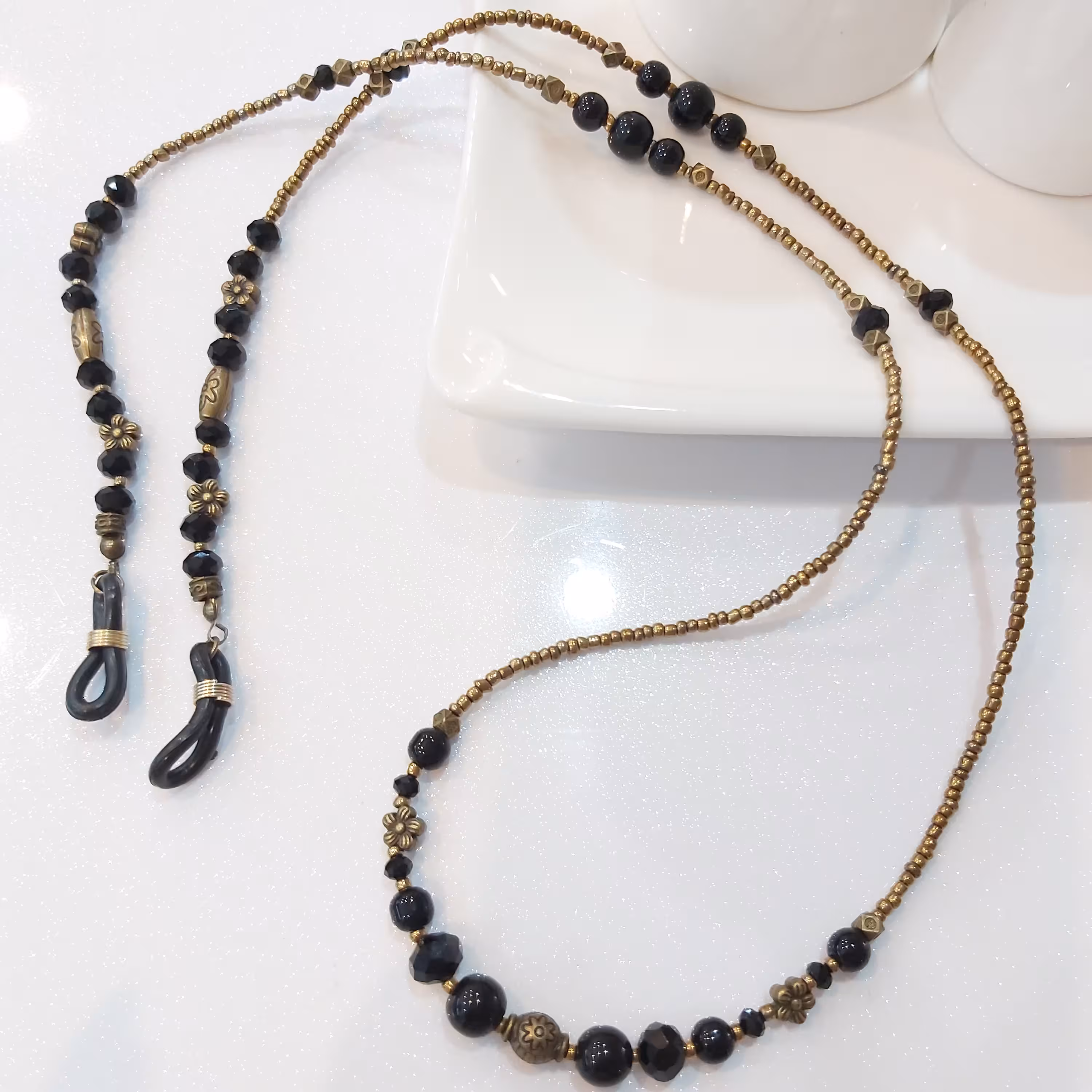 بند عینک کریستال و منجوق و خرجکارهای برنزی