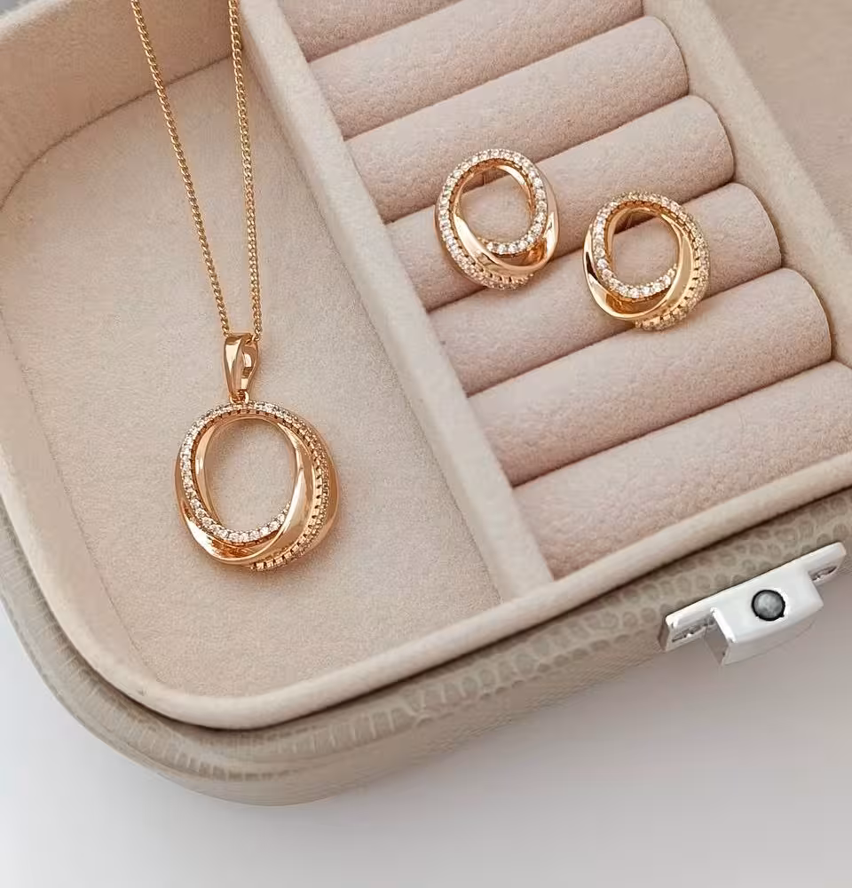 نیم ست زنانه ژوپینگ شامل گوشواره و گردنبند رنگ طلایی کد NIM141027W