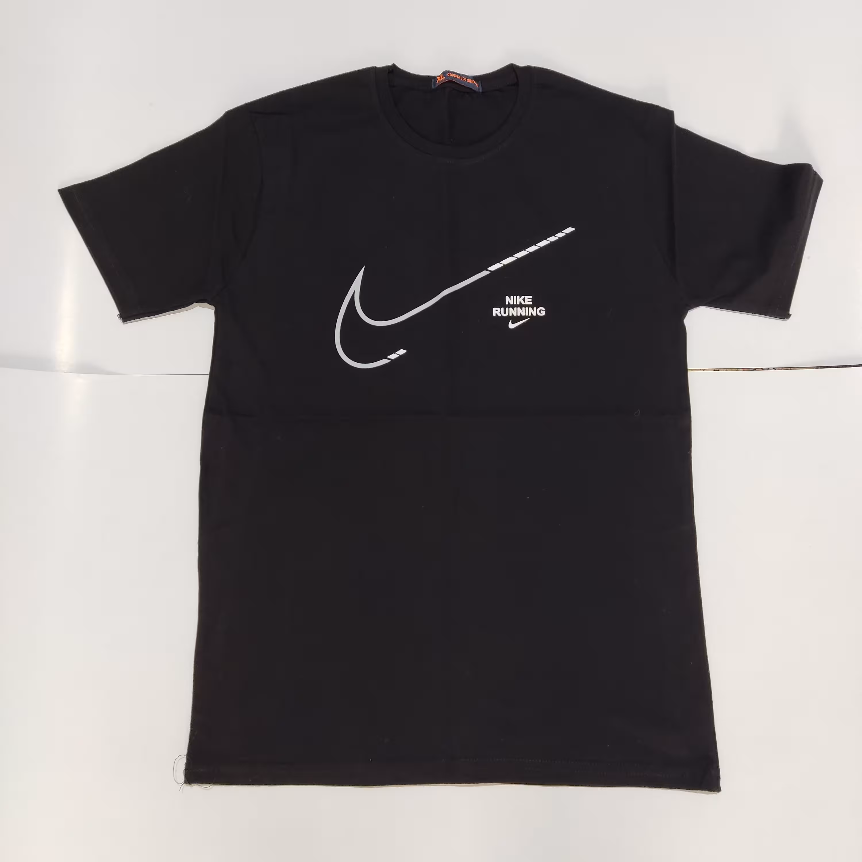 تیشرت اسپرت پسرانه و دخترانه نخ پنبه تک رنگ مشکی برند نایک در سایزهای لارج تا 3ایکس لارج