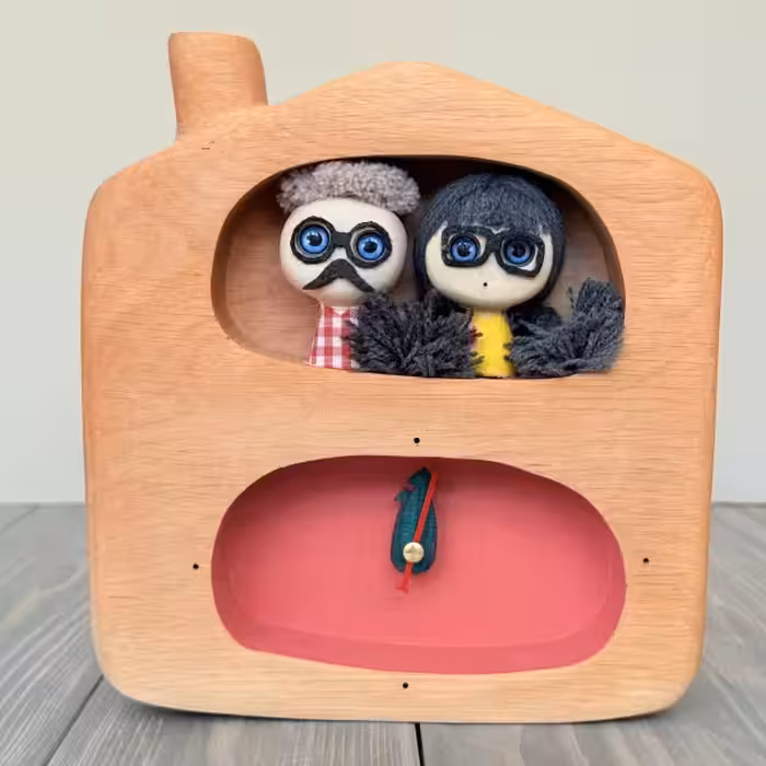 ساعت رومیزی آدمک دو مجسمه طرح پنج