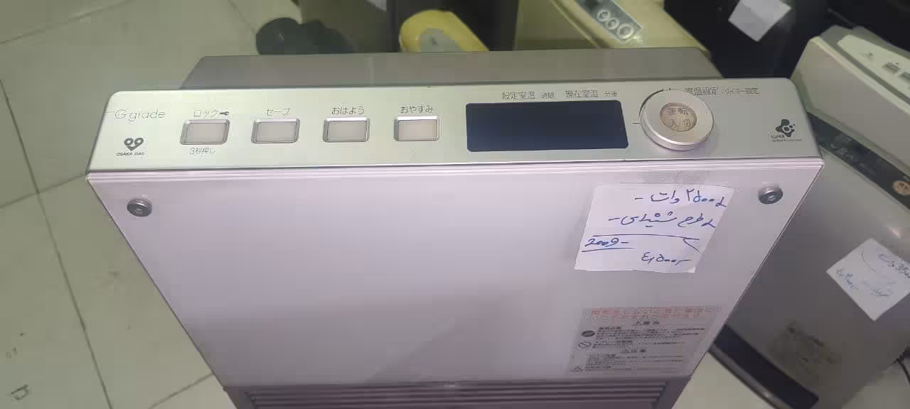 بخاری گازی برقی ژاپنی 2500 وات مدل  شیشه ای دست دوم