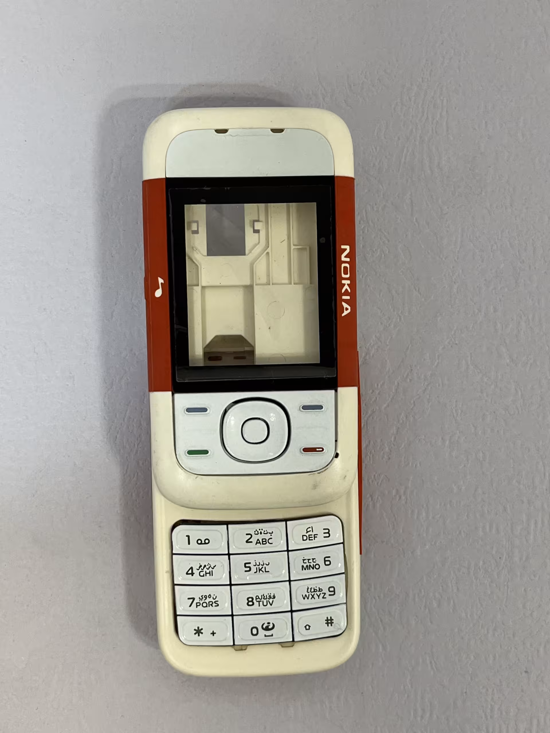 قاب نوکیا مدل Nokia 5200کیفیت جنس : ساخت کره &#8211; های کپی درجه 1 نو و آکبند ( رنگ سفید- قرمز) کامل &#8220;اصالت کالا&#8221;:&#8221;ساخت کره &#8211; های کپی درجه 1&#8243;