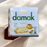 شکلات تبلت کرمی مغز باقلوا داماک نستله 100گرم