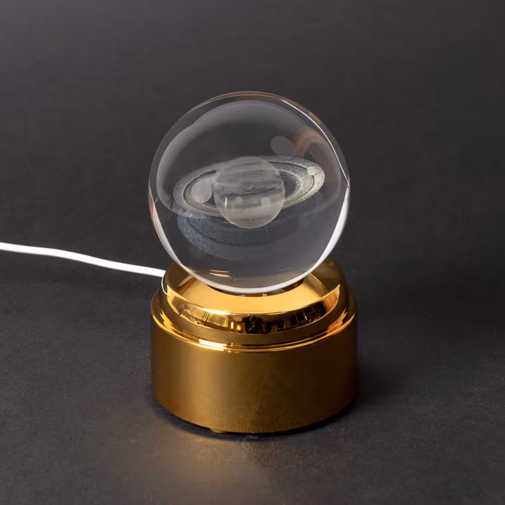 چراغ خواب گوی شیشه ای مدل چرخشی موزیکال طرح زحل