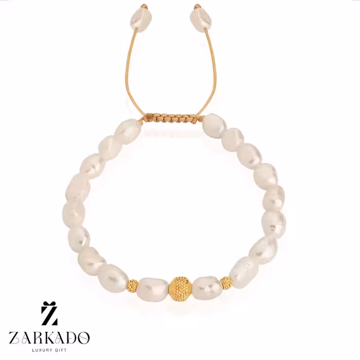 دستبند مروارید پرورشی و گوی طلا چکشی