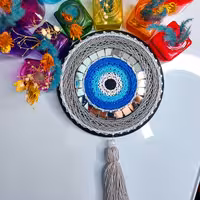 تابلو آینه دار چشم نظر  (میخ و نخ )در اندازه 15 سانت 