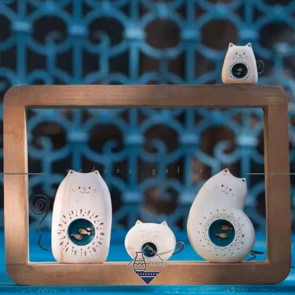 قاب دیواری گربه ماهی به دل چهار مجسمه