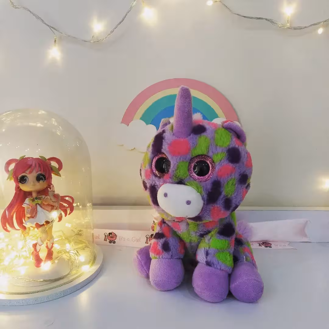 عروسک تک شاخ رنگی