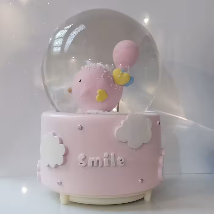 گوی موزیکال مدل پمپی جوجه صورتی و بادکنک