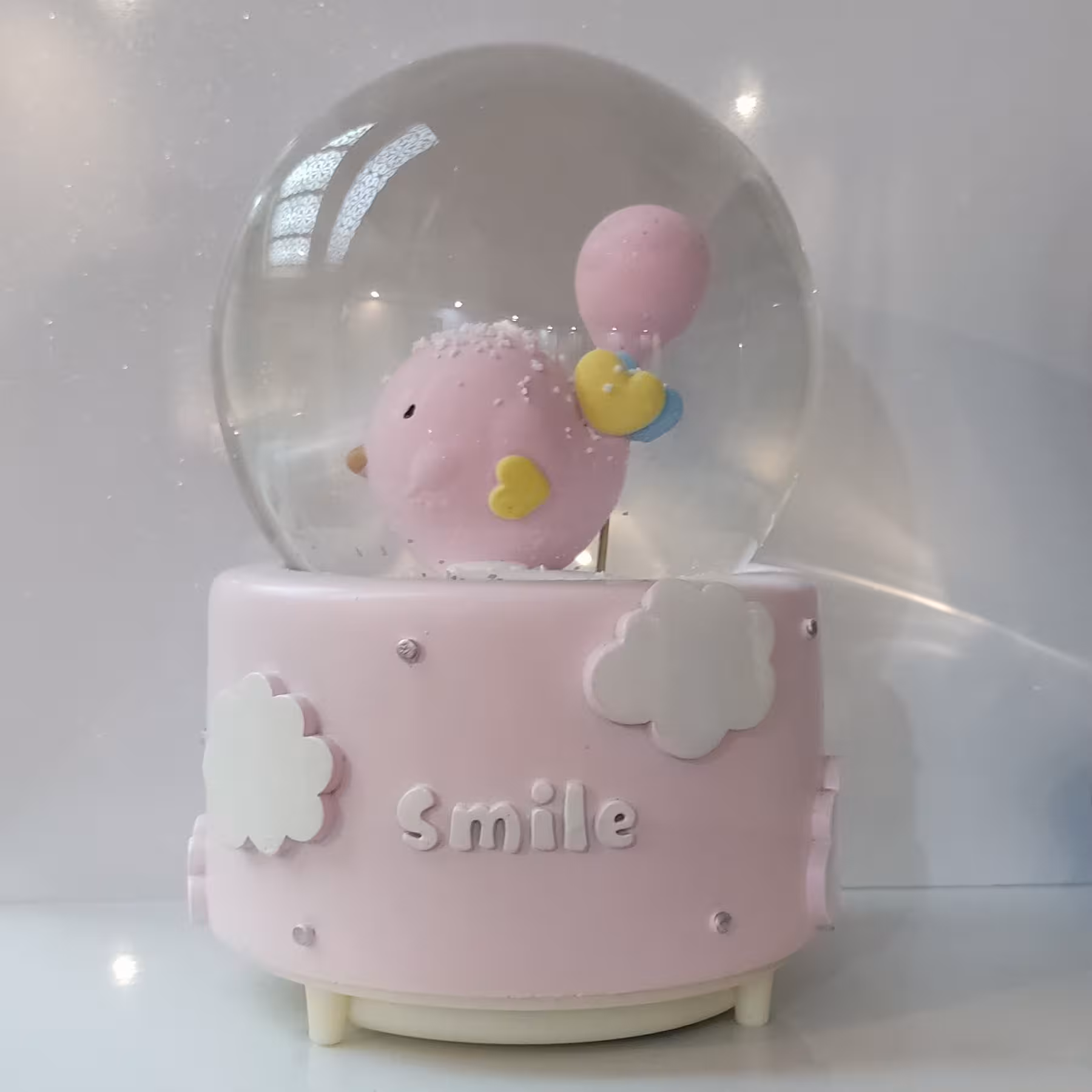 گوی موزیکال مدل پمپی جوجه صورتی و بادکنک