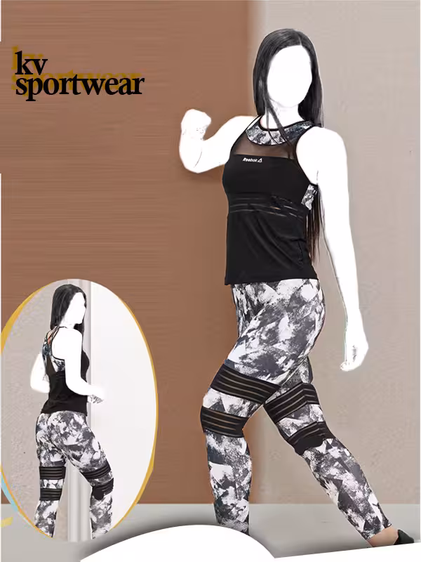 ست تاپ و لگ باشگاهی زنانه Reebok کد 002