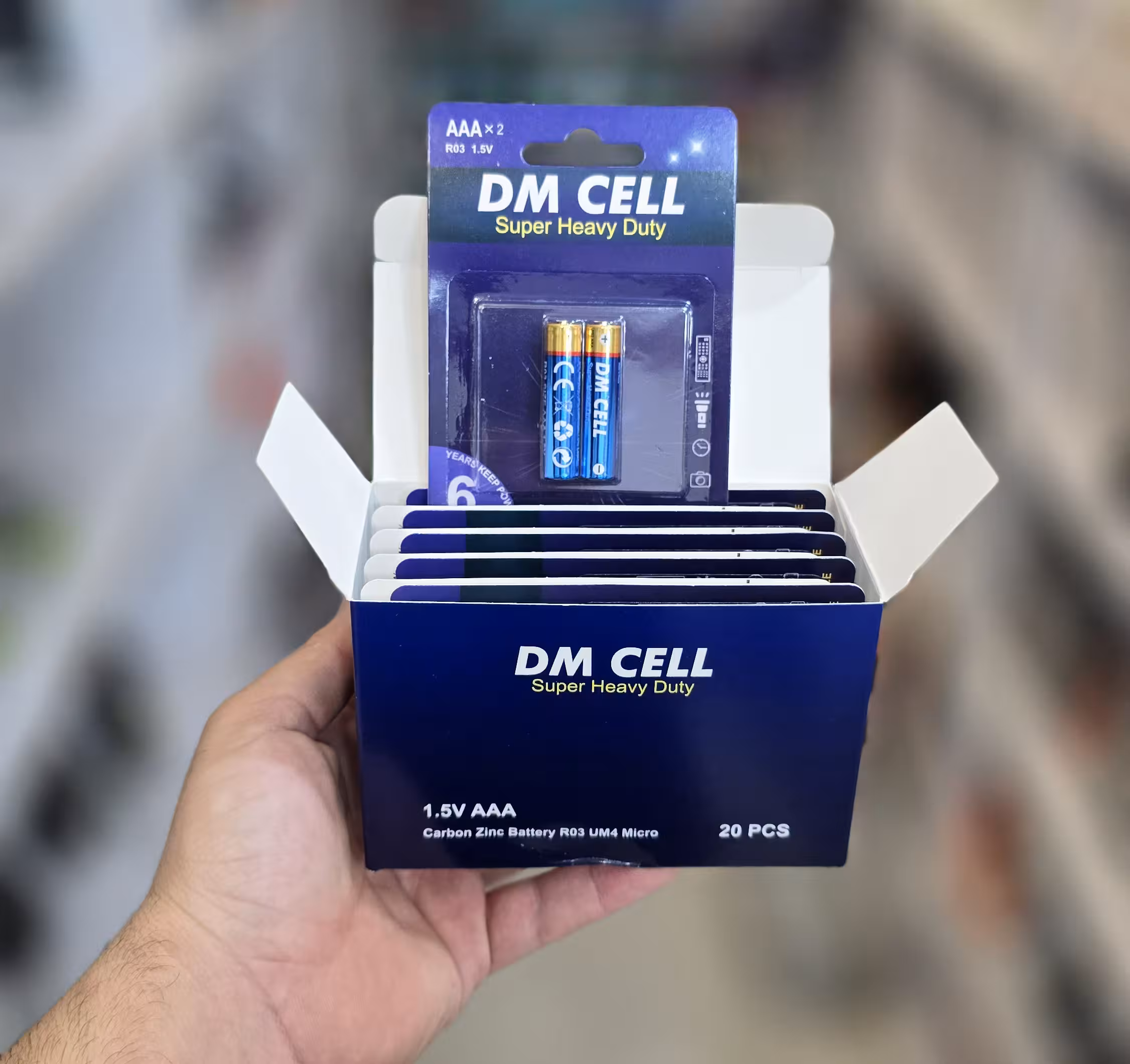 باتری نیم قلم DM CELL کارتی Super Heavy Duty
