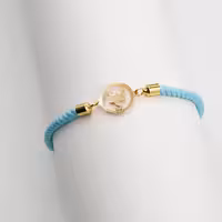 دستبند بافت طرح ماه تولد آبان