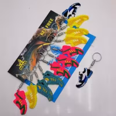 سرکلیدی سیلیکونی کفش کتانی فنری