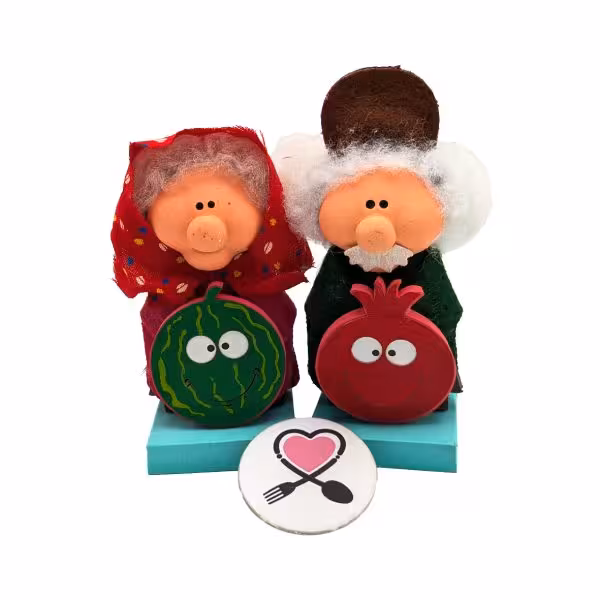 استند عروسکی زوج عمو و ننه سرما با انار و هندوانه کد 1 یلدا