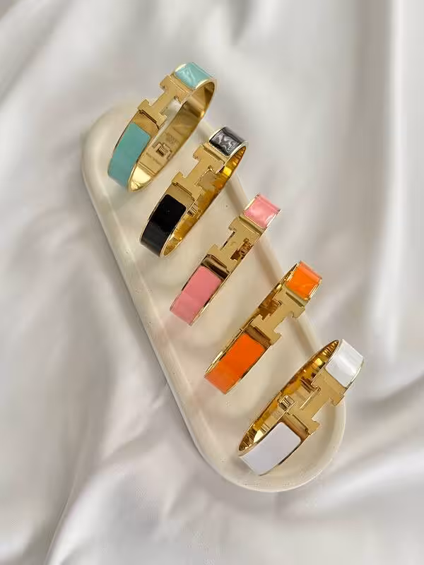 دستبند النگویی هرمس استیل رنگ ثابت  کاملا مشابه طرح اصلی  داخل کار حک برند شده