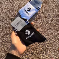 جوراب ساق بلند کانورس آل استار سفید و مشکی