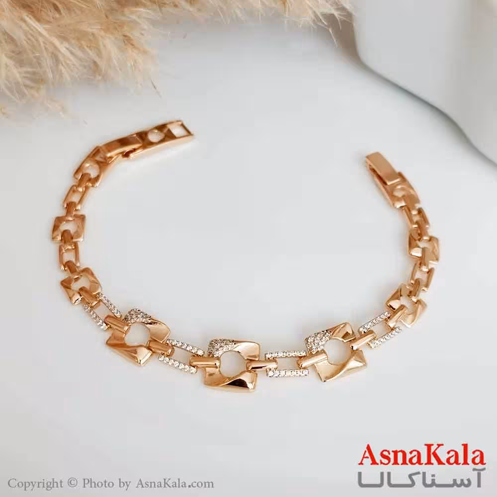 بدلیجات دستبند ژوپینگ اورجینال طلایی زنانه مدل مربع شکسته نگینی کد DSB18325W