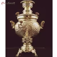سماور ذغالی 4 لیتری با بدنه ی برنجی و قلم زنی شده ی کار دست، بسیار زیبا و هنر ایرانی