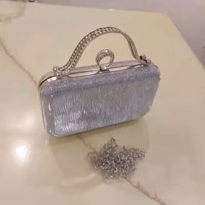 کیف مجلسی نقره ای مدل موج دار