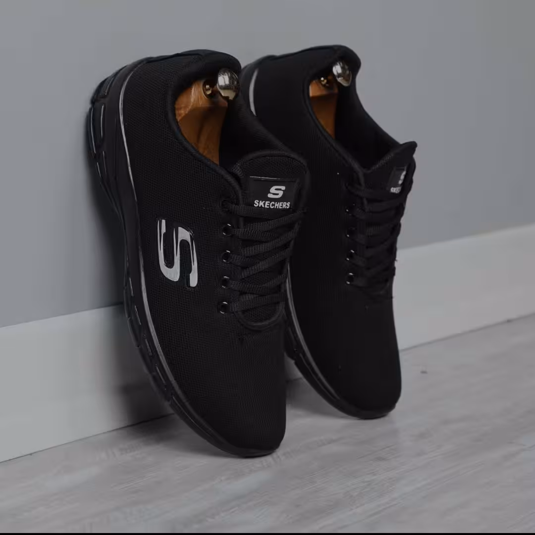 کتونی اسکیچرز حراجی مردانه مشکی رنگ باتیس بوتیک