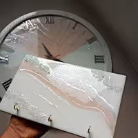 ساعت لبه دارباجاکلیدی صورتی
