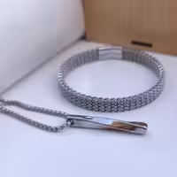 ست دستبند و گردنبند پسرانه استیل نقره ای