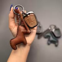 کاور ریموت پژو 206 – 207 – رانا و پارس مدل بالا دور فلزی وسط چرم با بند فانتزی