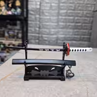 شمشیر فلزی 15 سانتی انیمه شیطان کش تومیوکا