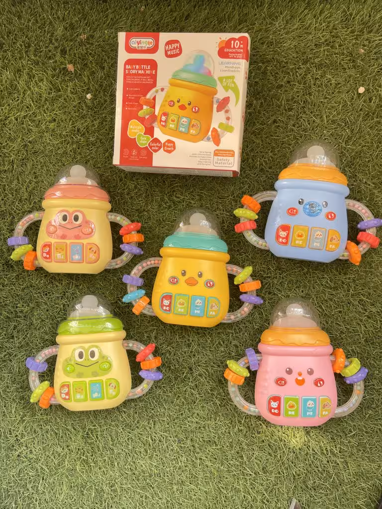 جغجغه دندانگیر موزیکال چراغدار طرح شیشه شیر