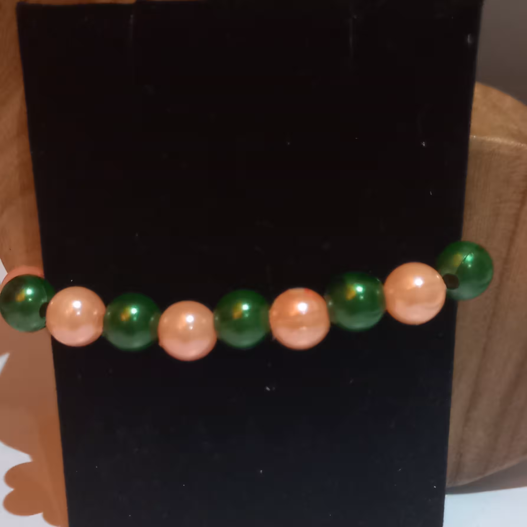 دستبند کشی مرواریدی رنگ صورتی و سبز                     