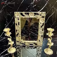 آینه و شمعدان برنزی سه تیکه کد 22 طرح گل یاس برجسته طلایی