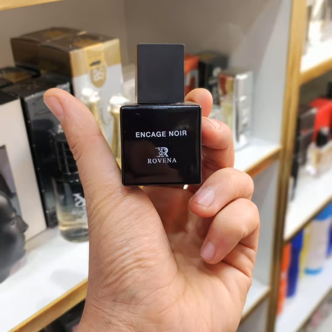 ادکلن مردانه لالیک مشکی حجم 25میل ساخت فرانسه از برند رونا .رایحه چوبی تند