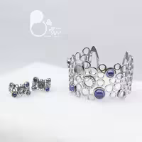 ست دستبند ‌و گوشواره نگین بنفش