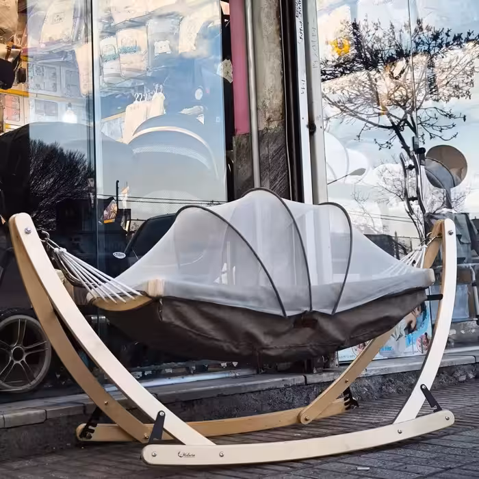 گهواره و بانوج نوزادی پایه چوبی رنگ نچرال با تحمل وزن بالا با اویز و پشه بند برند چیپولینو  chipolino