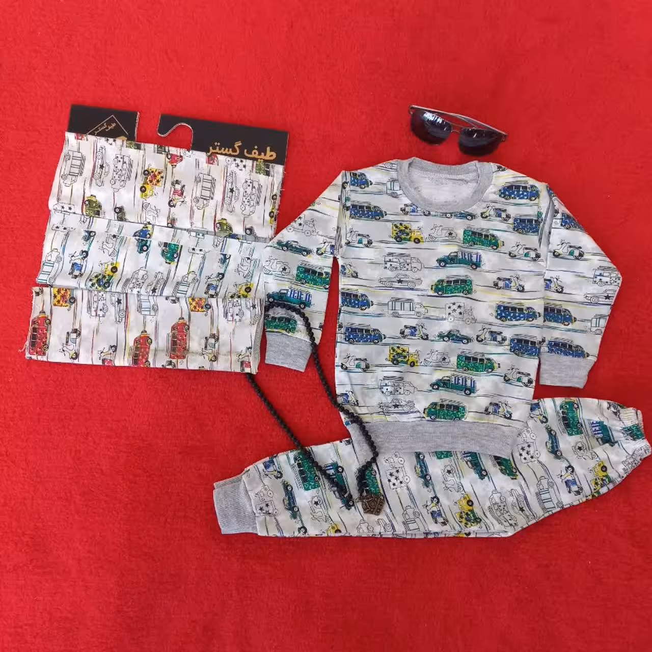 بلوز شلوار پسرانه طرح ماشین سایز 35تا50 فروش فقط به صورت عمده میباشد