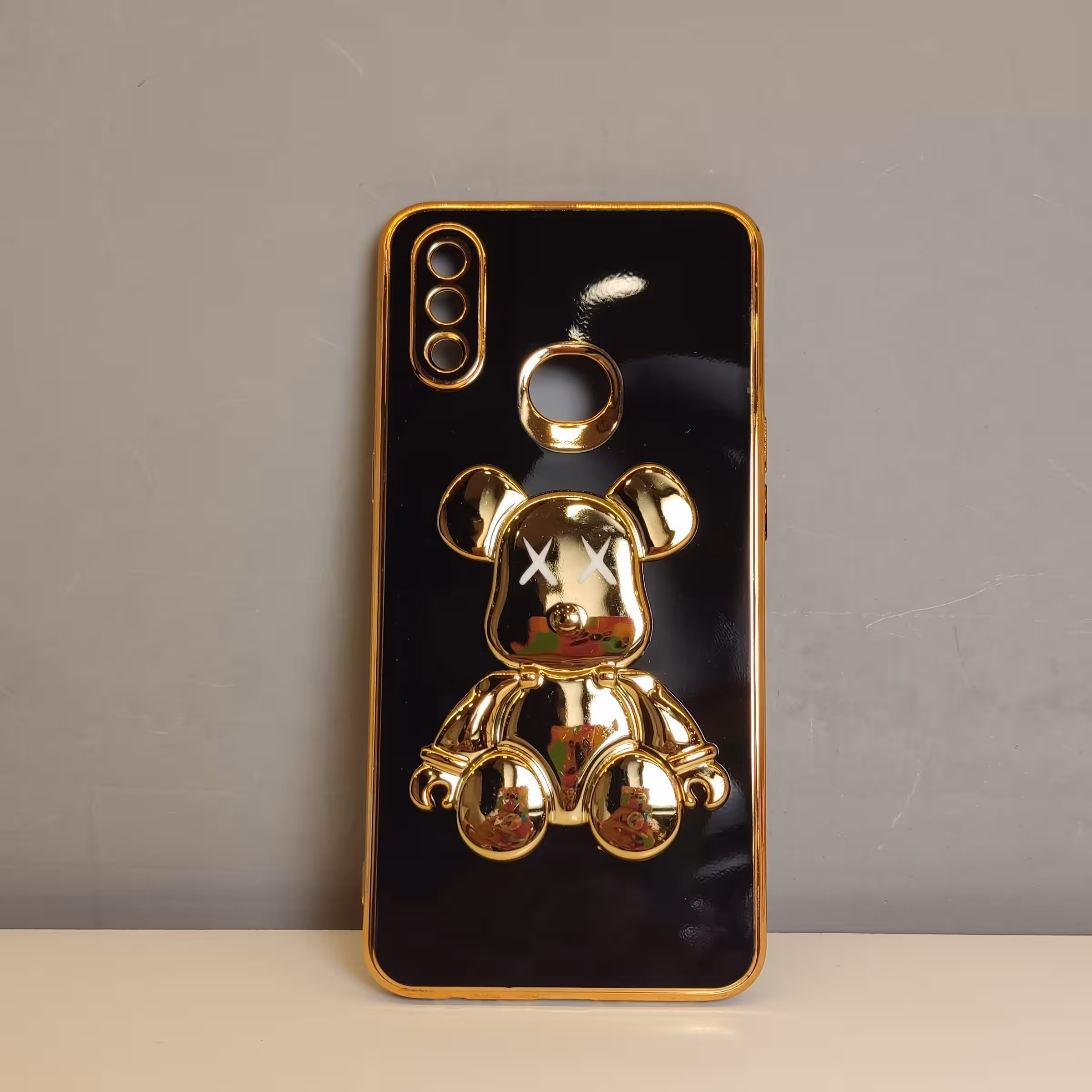 گارد گوشی مدلA10S تدی مشکی طلایی برجسته استندی