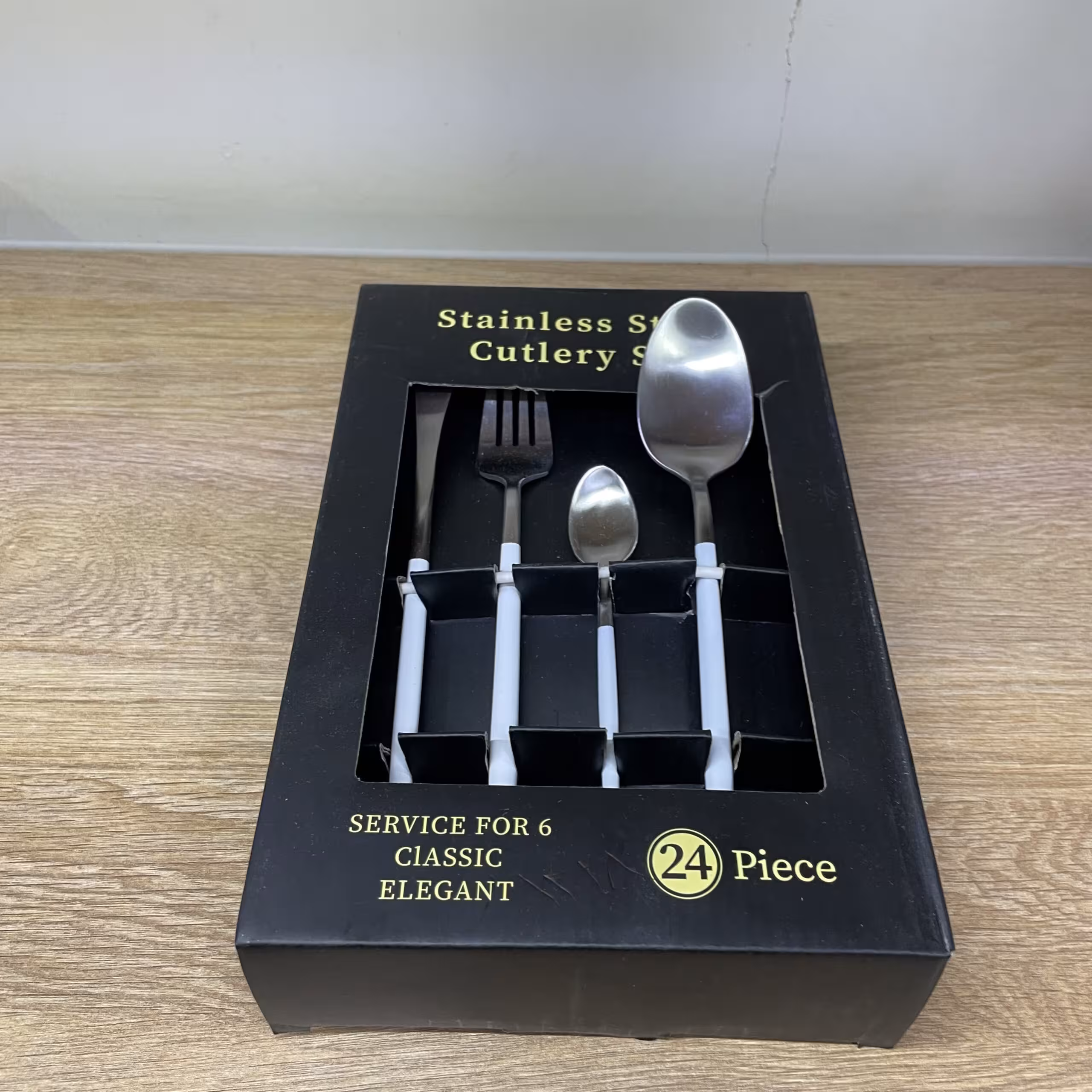 سرویس قاشق و چنگال استیل 6 نفره 24 پارچه نقره‌ای دسته سفید