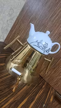 کتری قوری استیل هرمی راد