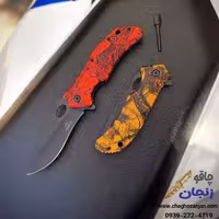 چاقو گربر چخماق دار دو رنگ نارنجی و قرمز