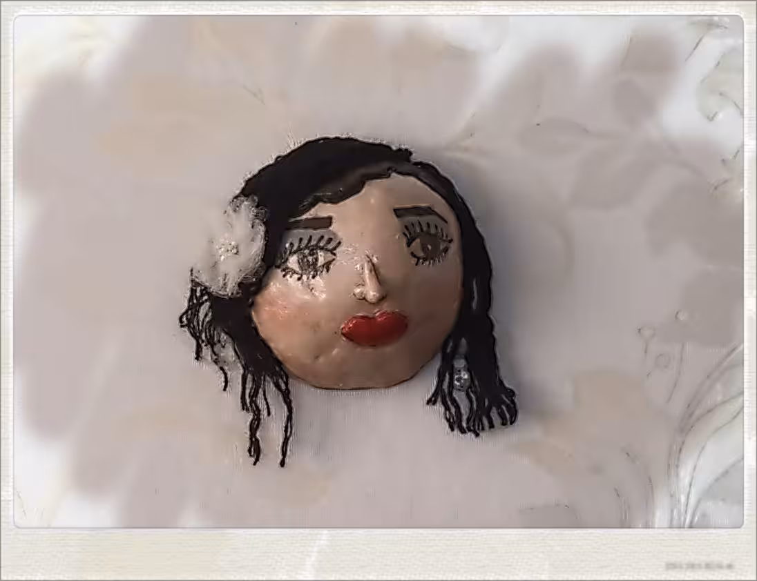 دیوارکوب چهره پاپیه ماشه