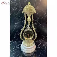 ساعت رو میزی برنزی طرح طاووس طلایی نفیس و زیبا